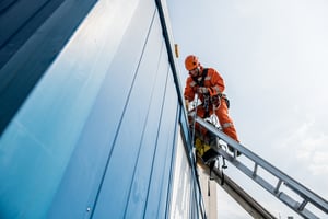 Safety worker on ladder